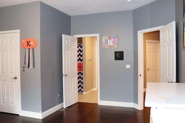 interior space with dark hardwood / wood-style flooring