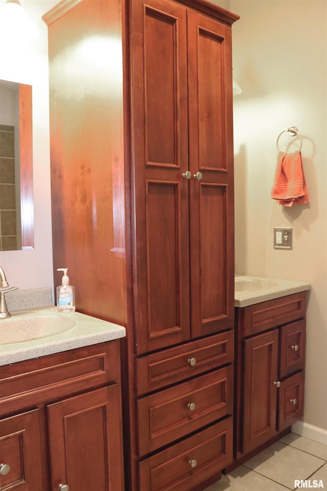 bathroom featuring tile patterned floors and vanity