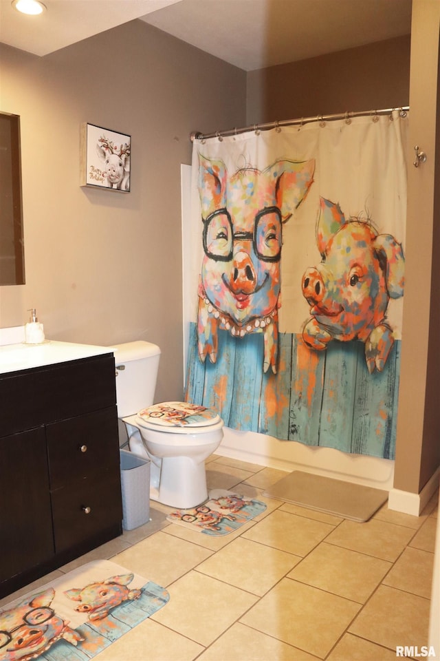 full bathroom with tile patterned floors, shower / bathtub combination with curtain, vanity, and toilet