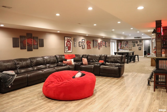 living room with light hardwood / wood-style flooring