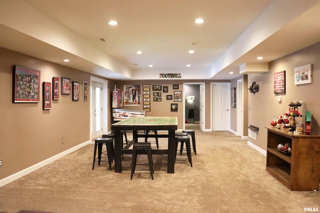 view of carpeted dining area