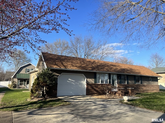 single story home featuring a front yard and a garage