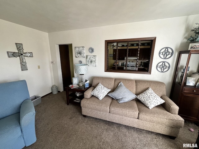 living room featuring dark colored carpet