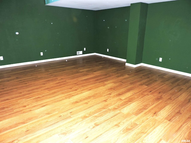 empty room with light wood-type flooring