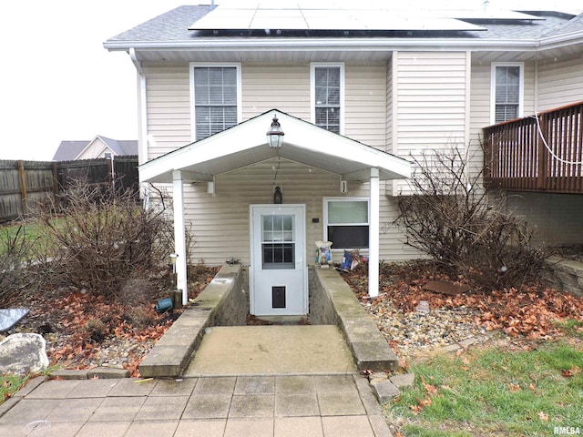 view of front of home with solar panels