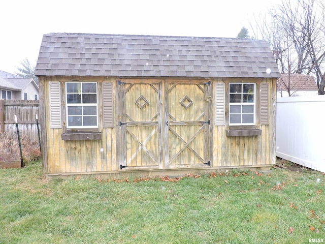 view of outdoor structure featuring a yard