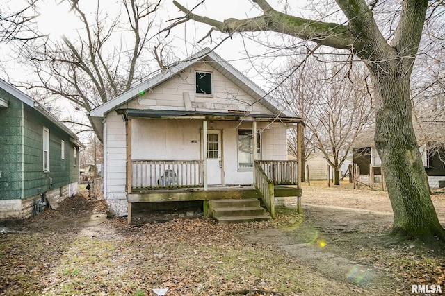 bungalow featuring covered porch