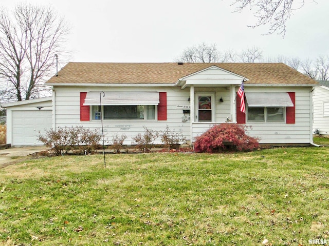 single story home featuring a garage and a front yard