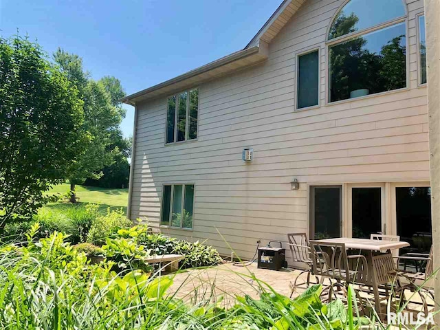 back of house featuring a patio area