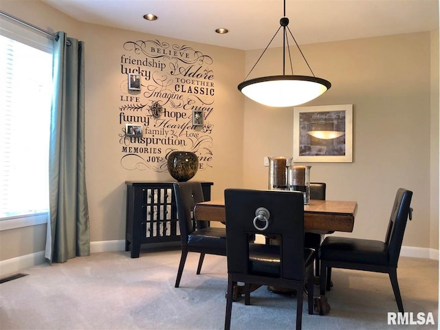 dining room with carpet floors