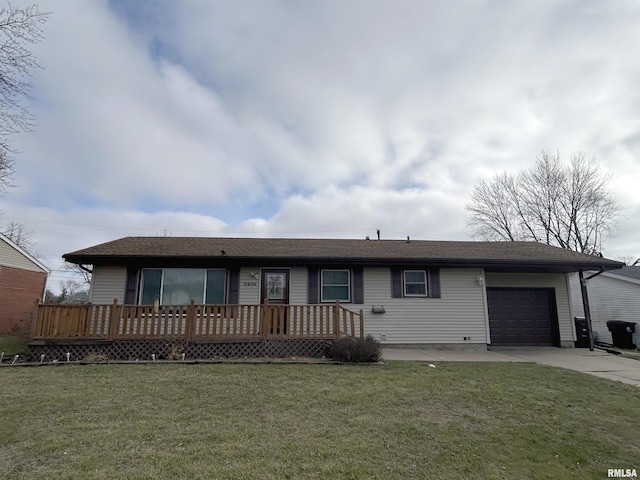 ranch-style house with a garage and a front lawn