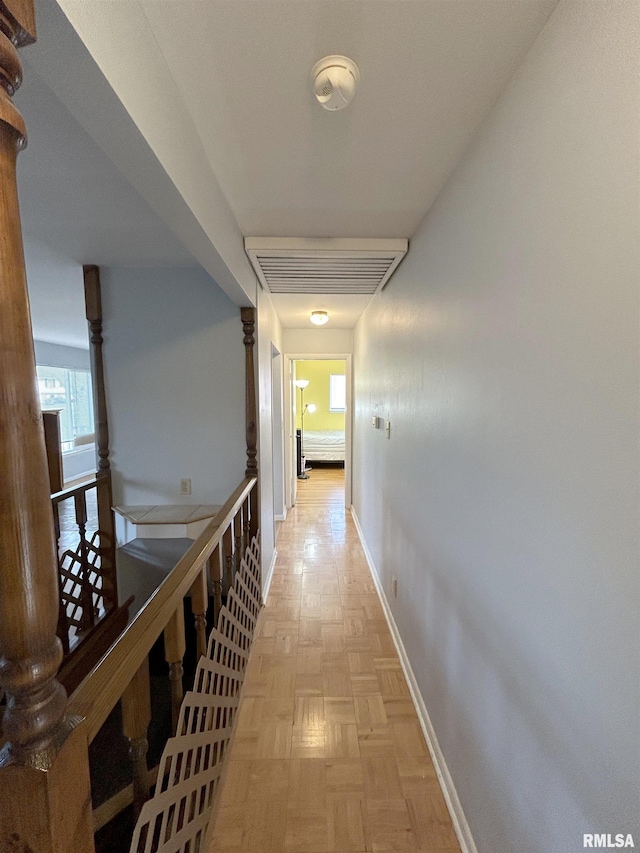 hallway with light parquet flooring