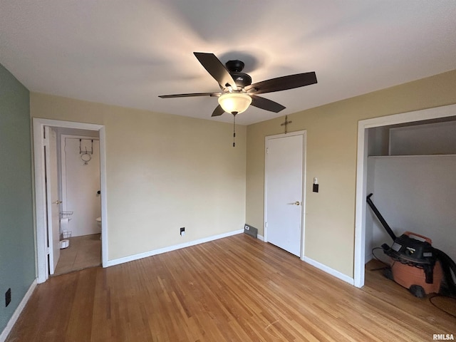 unfurnished bedroom featuring ceiling fan and light hardwood / wood-style floors