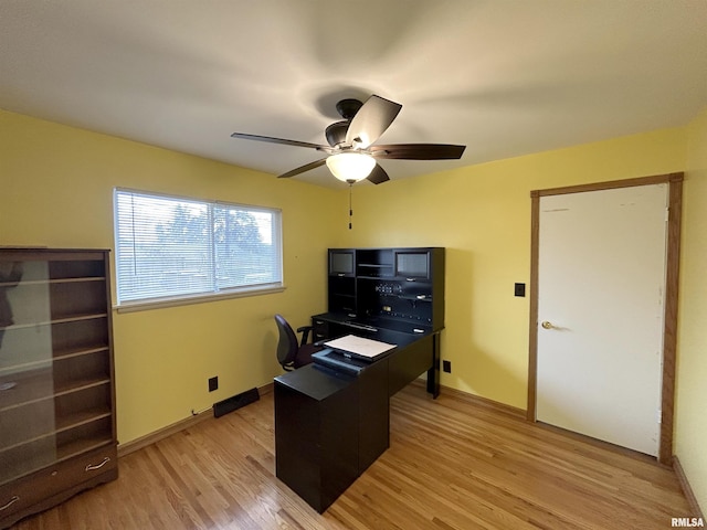 office featuring ceiling fan and light hardwood / wood-style floors