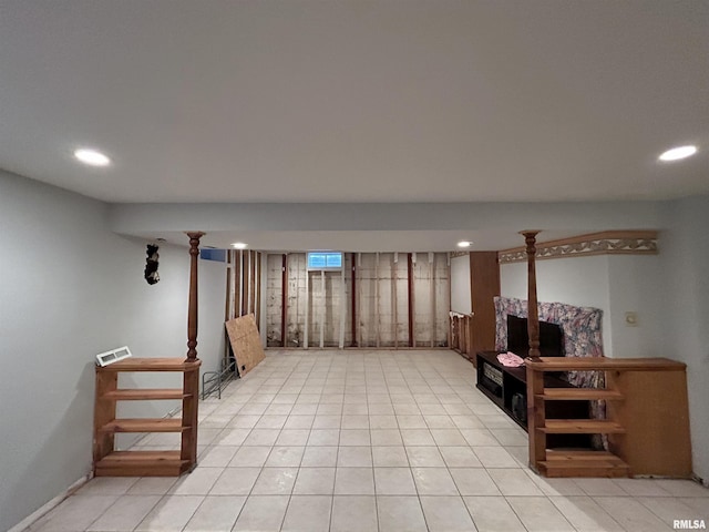 living room with light tile patterned floors