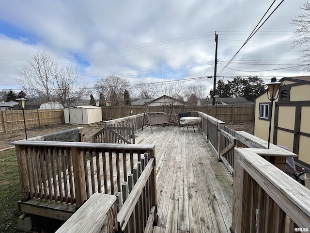 wooden deck with a storage unit