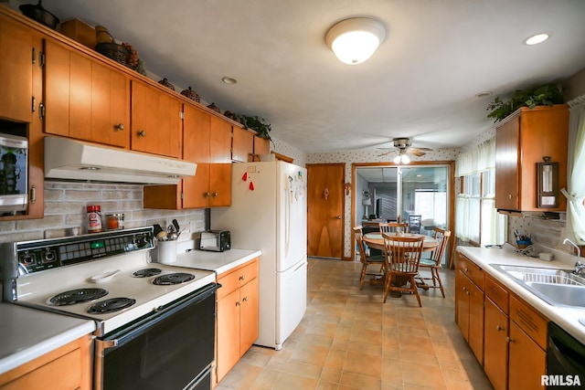 kitchen featuring decorative backsplash, white appliances, ceiling fan, and sink