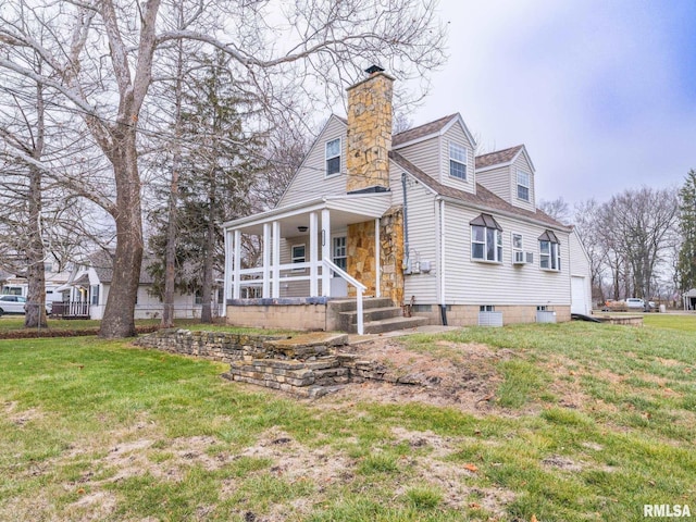 view of front facade with cooling unit, a porch, and a front yard