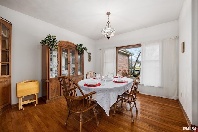 dining room featuring dark hardwood / wood-style floors