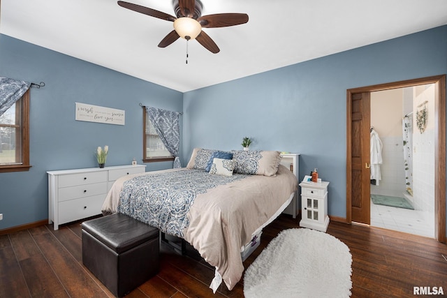 bedroom with ceiling fan, ensuite bathroom, and dark hardwood / wood-style floors