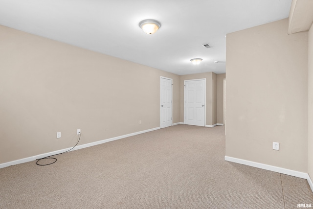 empty room featuring carpet flooring