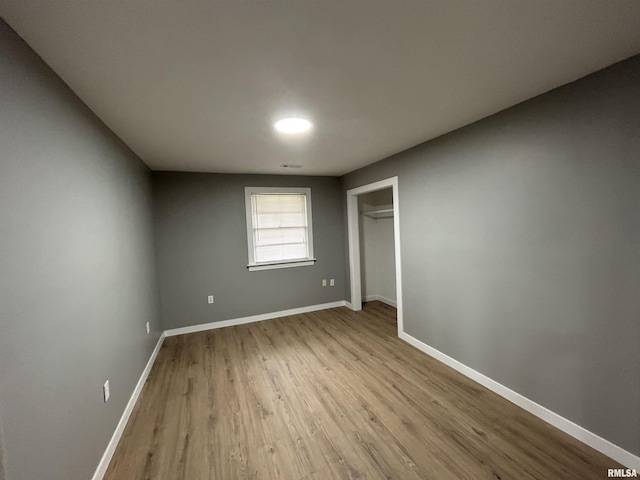 unfurnished bedroom with light hardwood / wood-style floors