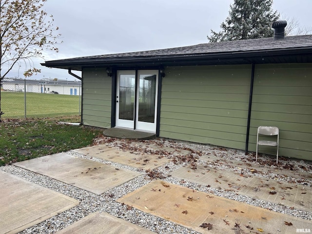 rear view of property featuring a patio