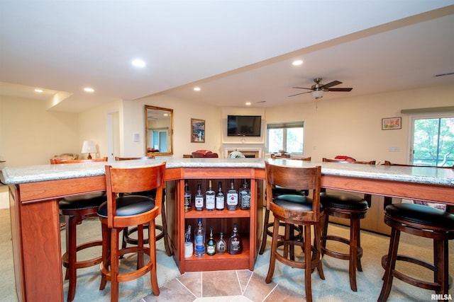 bar featuring ceiling fan