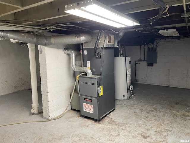 basement with heating unit, electric panel, and water heater