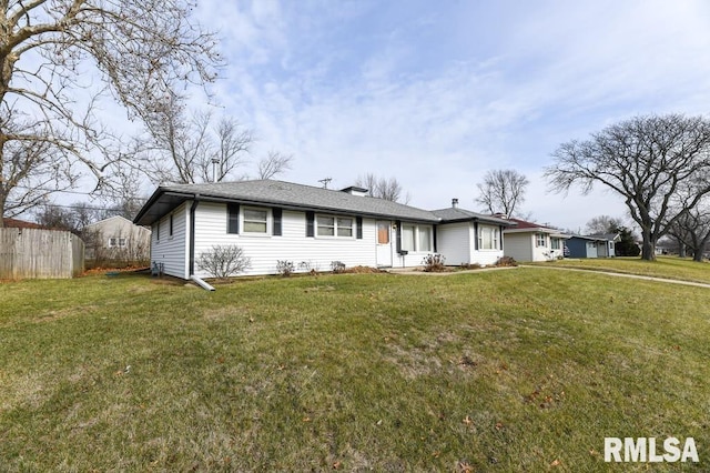 single story home featuring a front yard