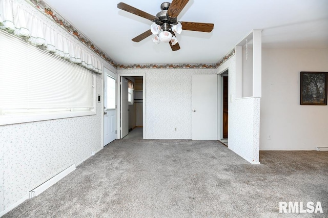 unfurnished bedroom featuring light carpet and ceiling fan