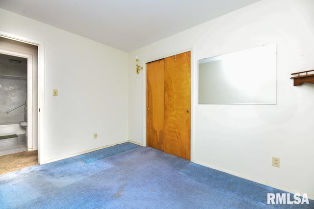 empty room featuring carpet flooring