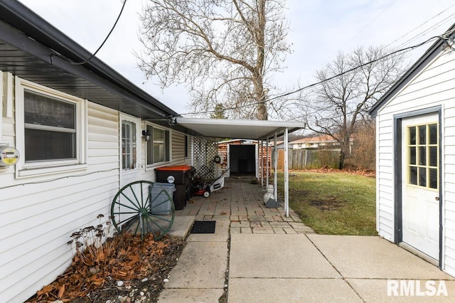 view of patio / terrace with a carport