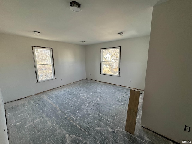 spare room featuring plenty of natural light