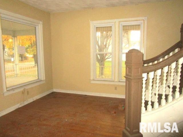 interior space with dark hardwood / wood-style flooring