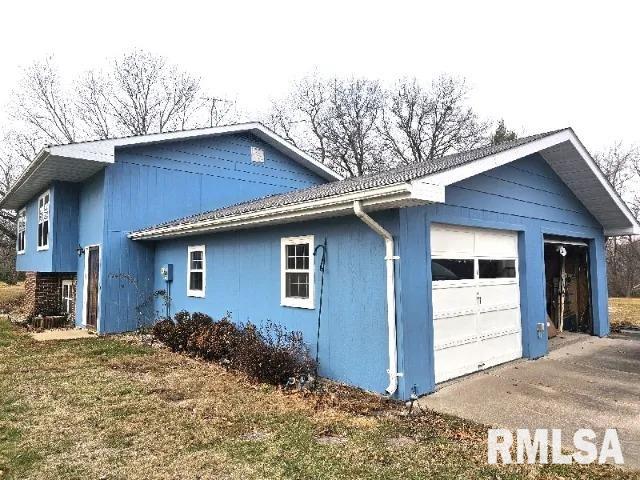 view of home's exterior with a garage