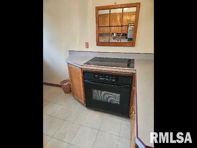 interior details with black appliances