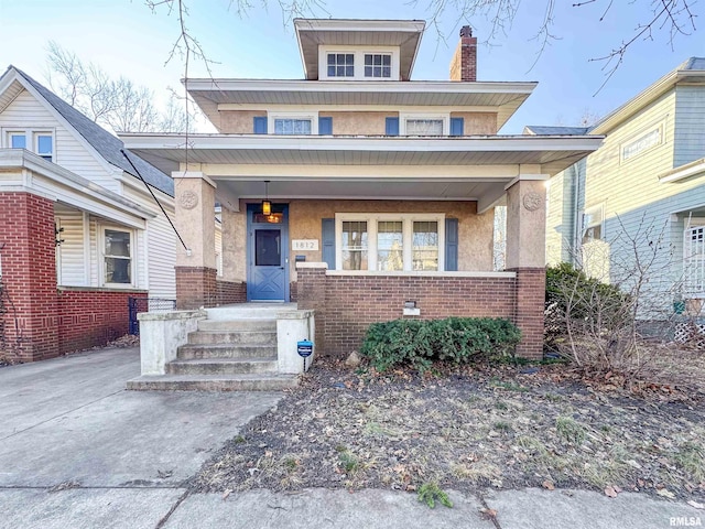 view of front of property featuring covered porch