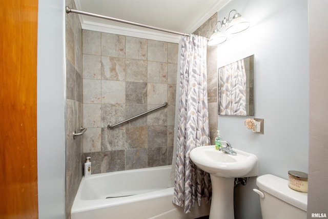 bathroom featuring shower / bath combo and toilet