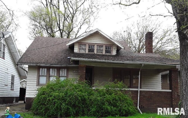 bungalow-style house featuring a porch