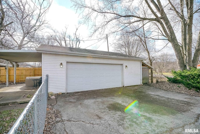 garage featuring a carport