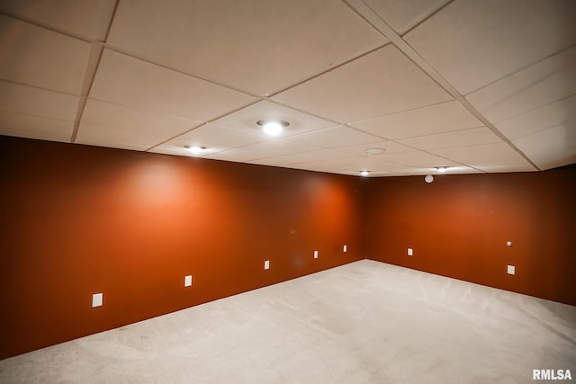 basement featuring a paneled ceiling