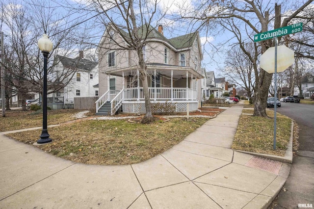 view of front of property featuring covered porch