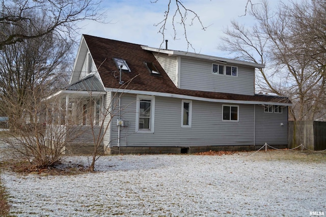 view of snow covered house