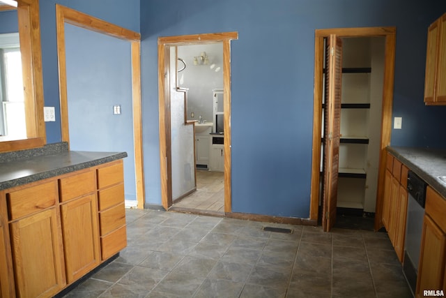 kitchen with stainless steel dishwasher