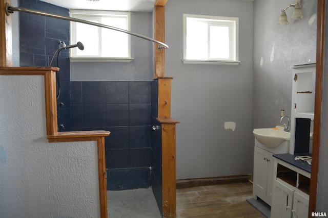 bathroom with plenty of natural light and vanity