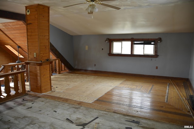 interior space with ceiling fan and lofted ceiling