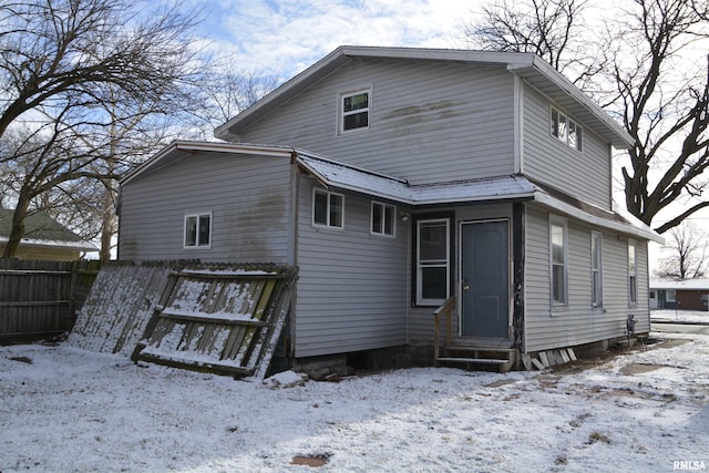 view of snow covered property