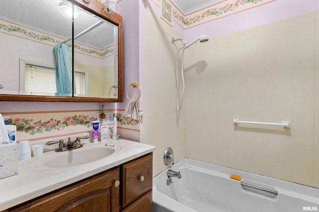 bathroom featuring vanity and shower / bathtub combination with curtain