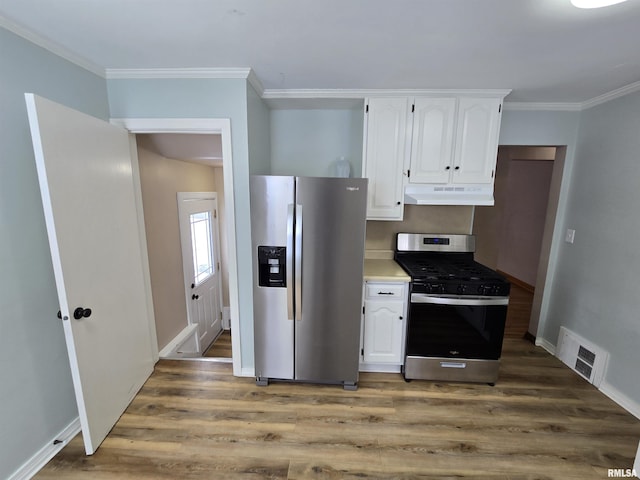 kitchen featuring white cabinetry, dark hardwood / wood-style flooring, and appliances with stainless steel finishes